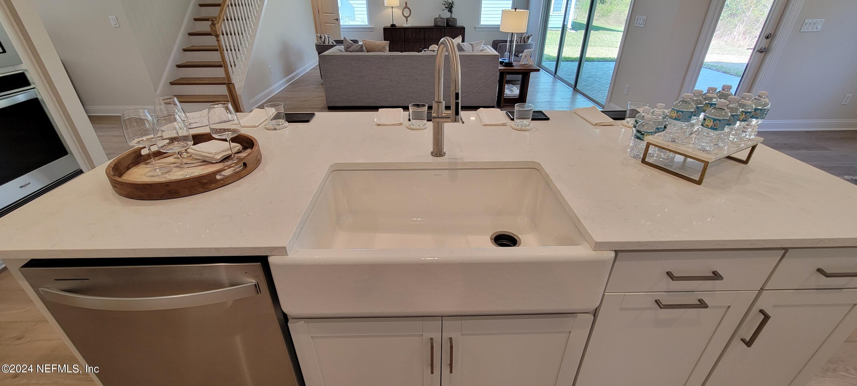 307 Ranch Land Circle St. Johns, FL 32259 - Photo 14 of 95 a bathroom with a sink and a mirror