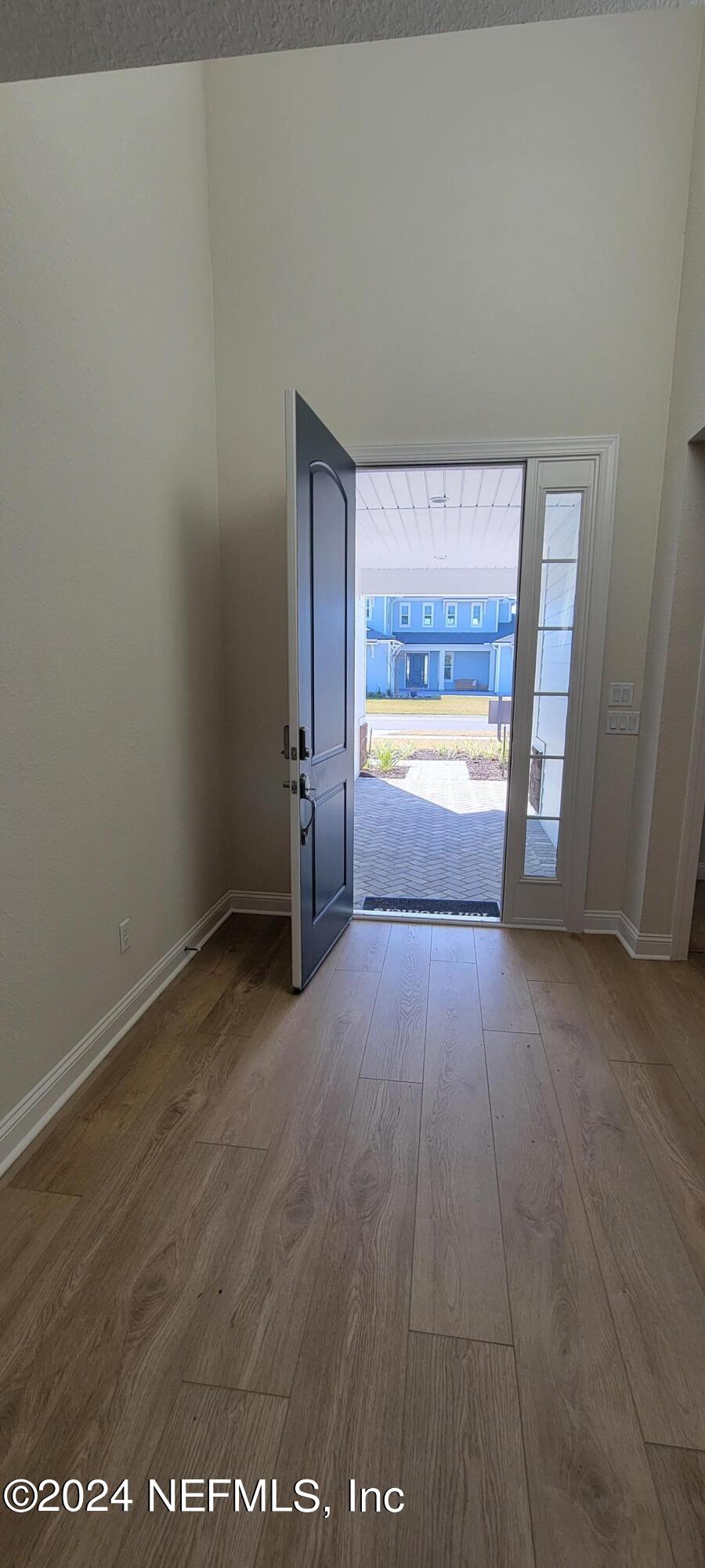 307 Ranch Land Circle St. Johns, FL 32259 - Photo 25 of 95 an empty room with an empty space and window