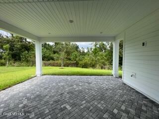 307 Ranch Land Circle St. Johns, FL 32259 - Photo 33 of 95 a view of a garden with an outdoor space