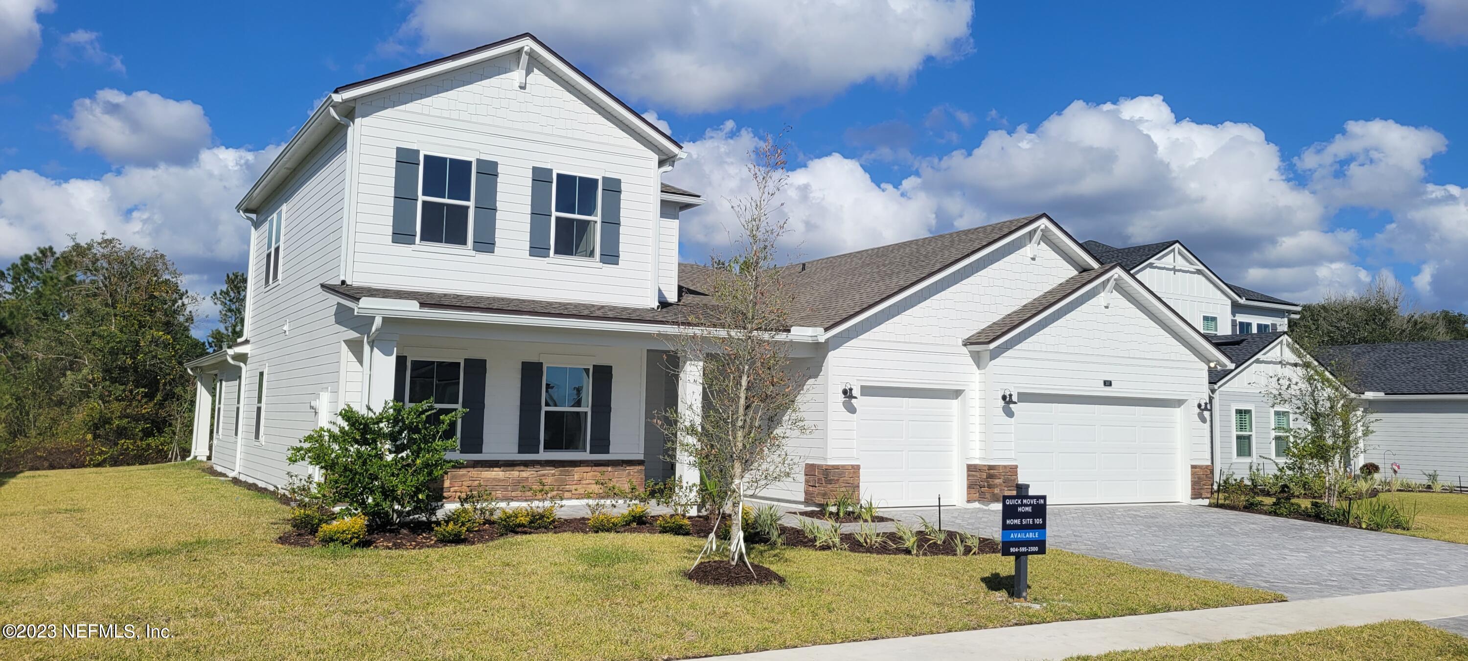 307 Ranch Land Circle St. Johns, FL 32259 - Photo 4 of 95 a front view of a house with a yard