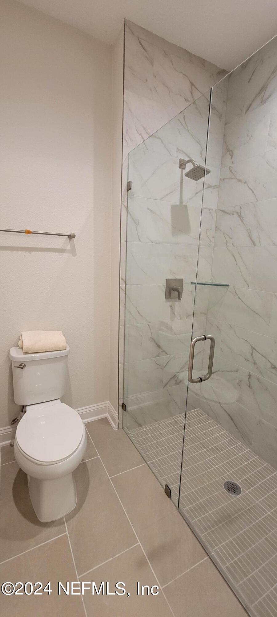 307 Ranch Land Circle St. Johns, FL 32259 - Photo 42 of 95 a bathroom with a toilet and a shower