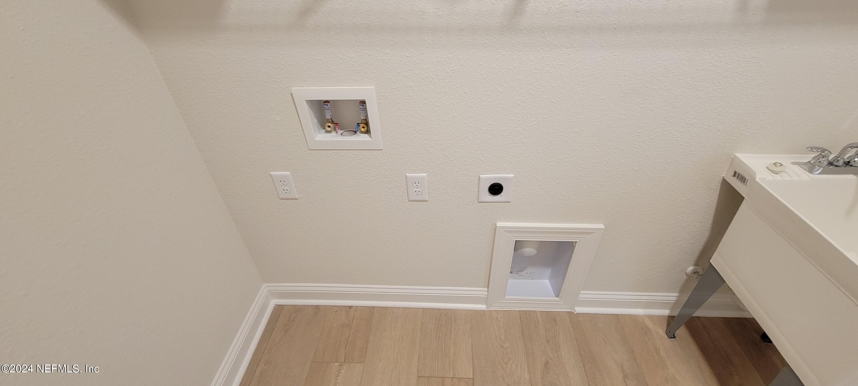 307 Ranch Land Circle St. Johns, FL 32259 - Photo 58 of 95 a view of an empty room with wooden floor and a window