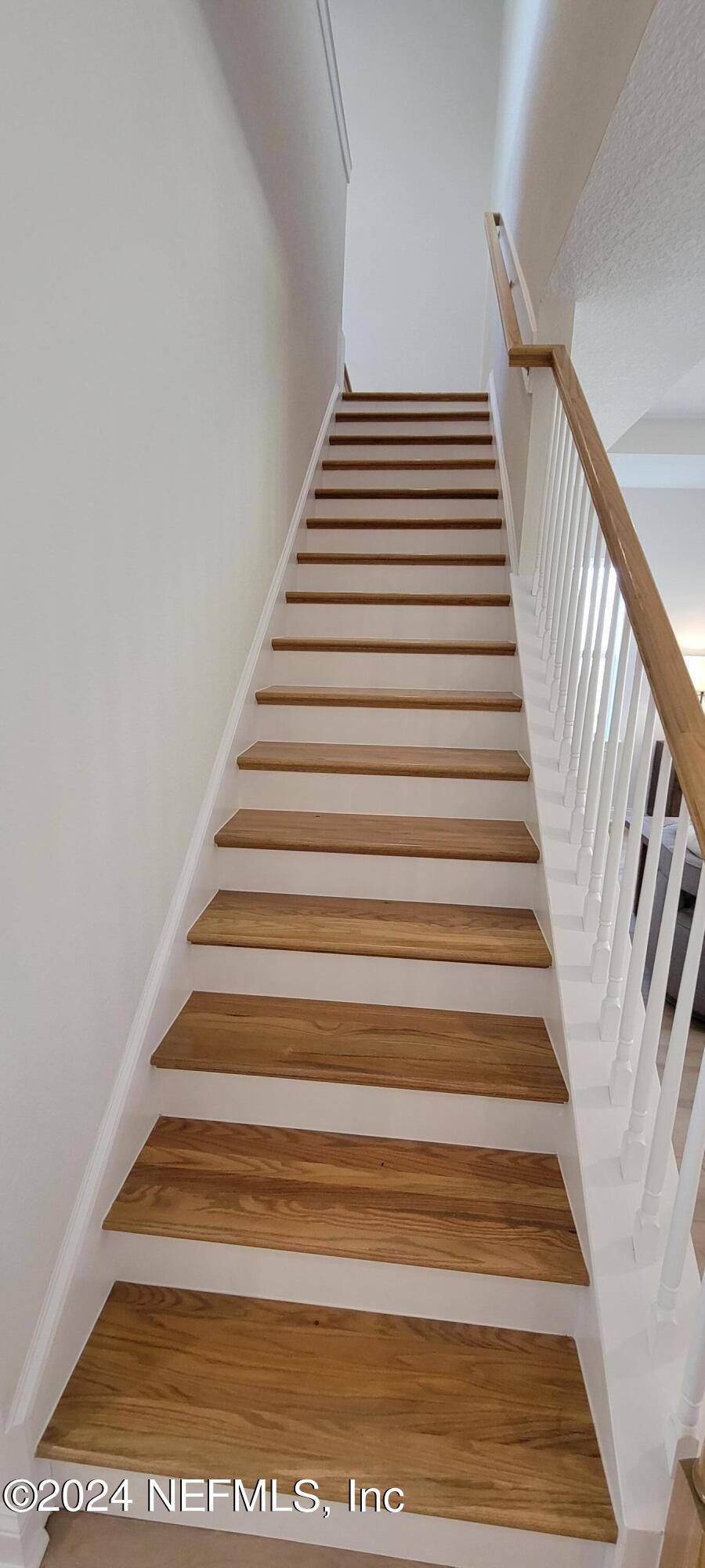 307 Ranch Land Circle St. Johns, FL 32259 - Photo 60 of 95 Oak tread stairs and open railing