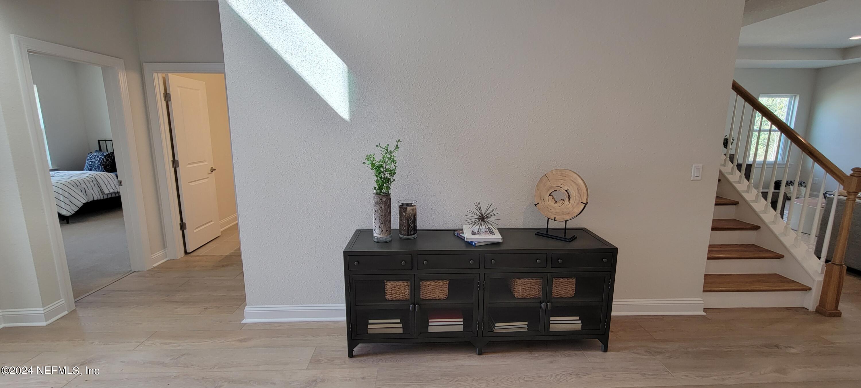 307 Ranch Land Circle St. Johns, FL 32259 - Photo 6 of 95 a view of a workspace with furniture and entryway