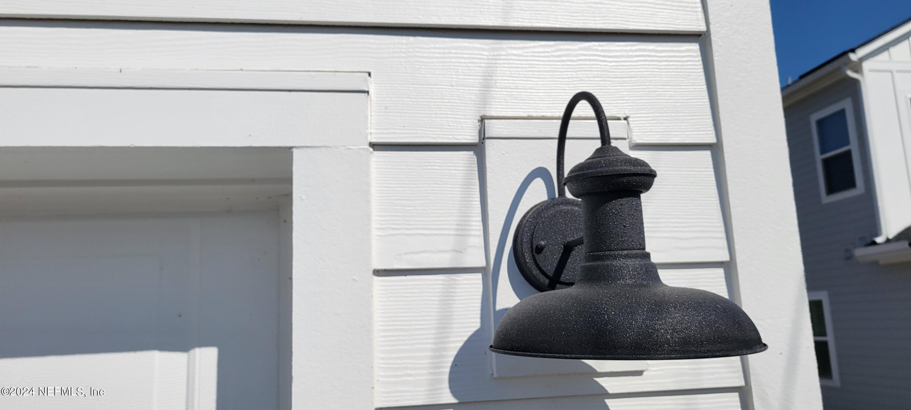 307 Ranch Land Circle St. Johns, FL 32259 - Photo 85 of 95 a close view of a utility room with dryer and washer