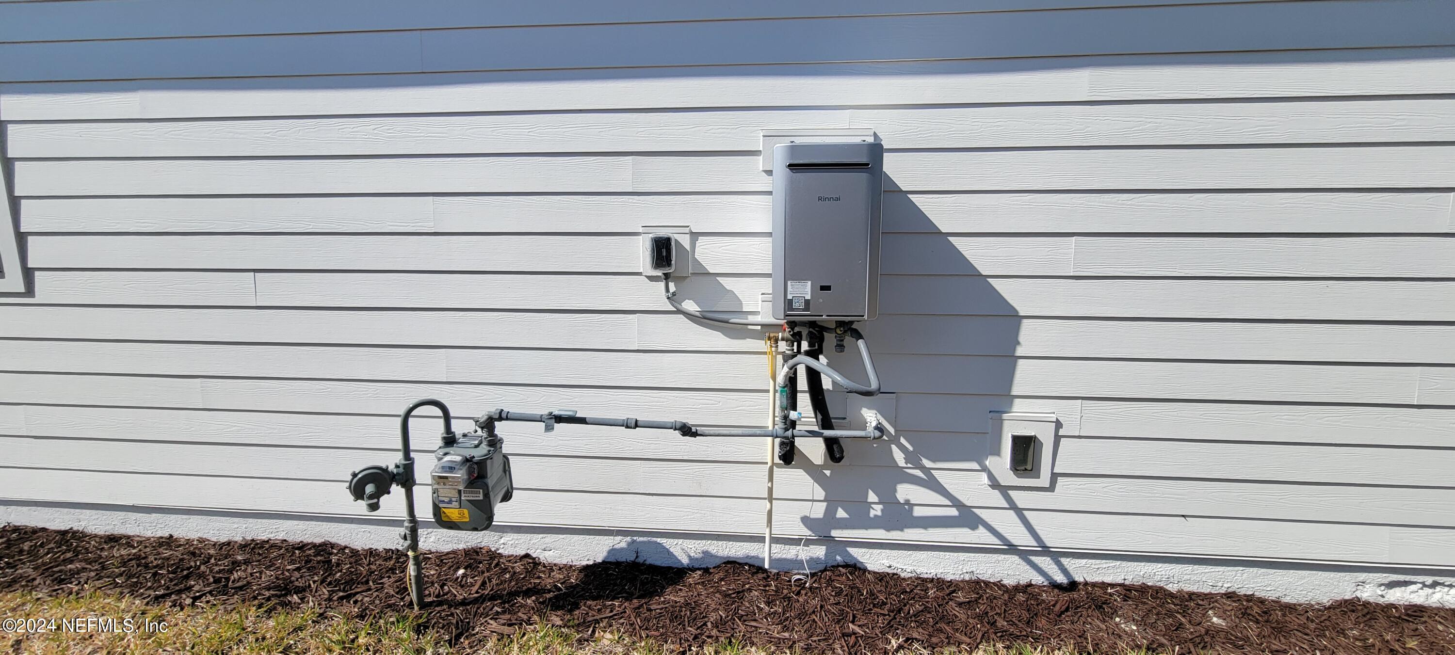 307 Ranch Land Circle St. Johns, FL 32259 - Photo 93 of 95 Tankless Nat Gas water heater