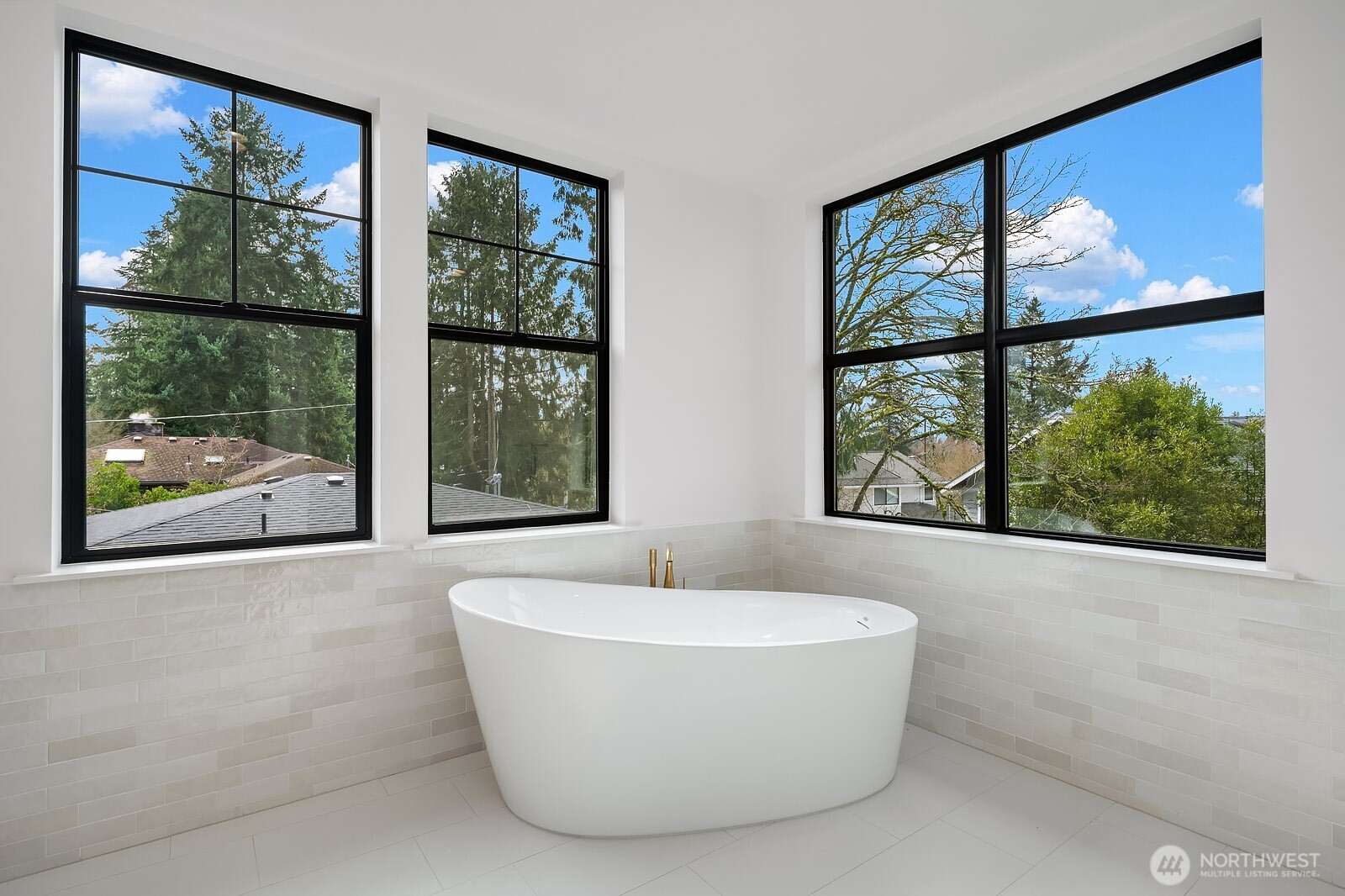 2615 Northeast 87th Street Seattle, WA 98115 - Photo 22 of 40 a white bath tub sitting next to a window