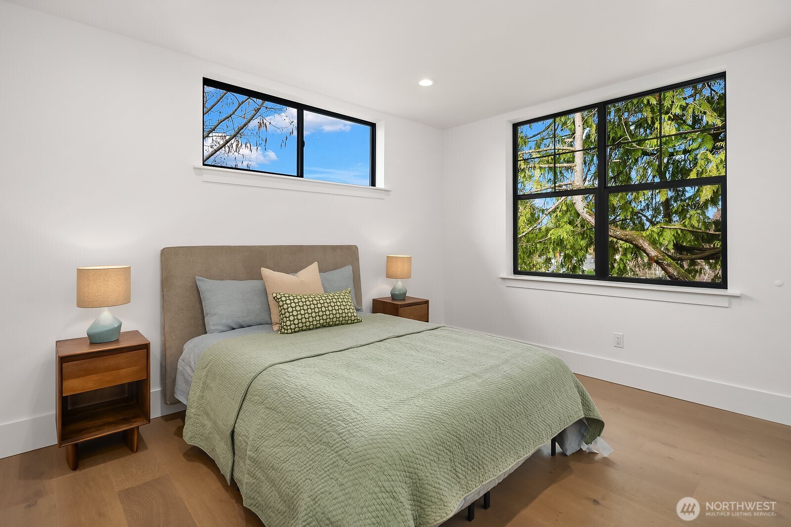 2615 Northeast 87th Street Seattle, WA 98115 - Photo 28 of 40 a bedroom with a bed and a window