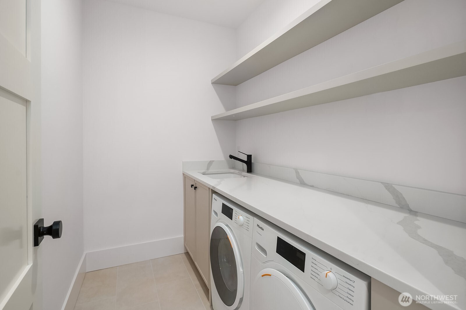 2615 Northeast 87th Street Seattle, WA 98115 - Photo 29 of 40 a utility room with dryer and washer
