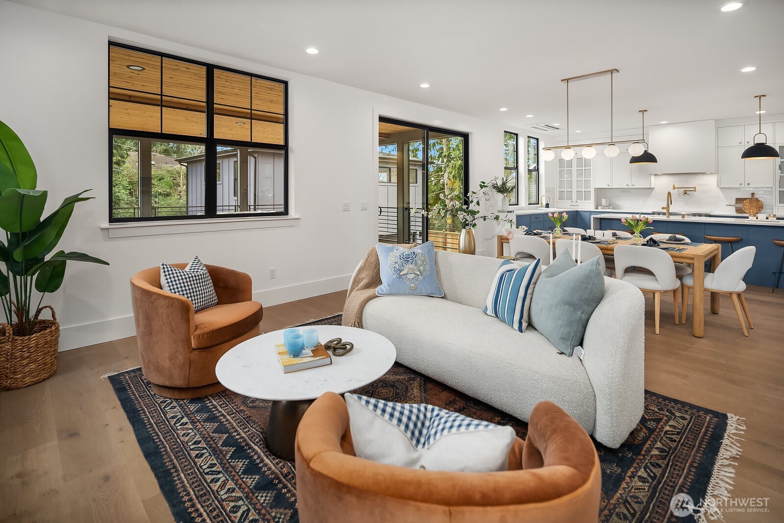 2615 Northeast 87th Street Seattle, WA 98115 - Photo 7 of 40 a living room with furniture and a potted plant