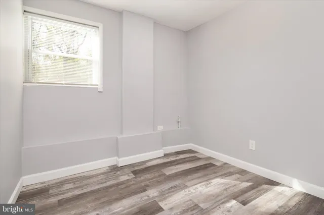 a view of a window in an empty room