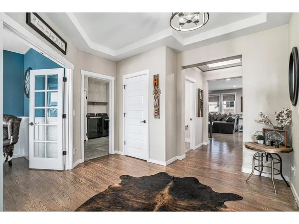 a view of livingroom with furniture and wooden floor