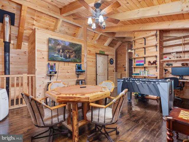 a bedroom with a bed and furniture