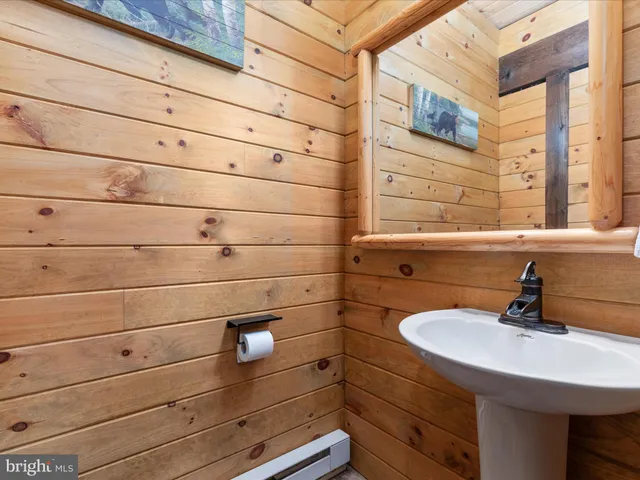 a bedroom with a bed and furniture