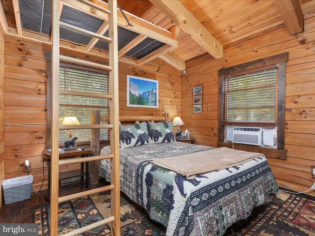 a view of balcony with wooden floor and outdoor seating