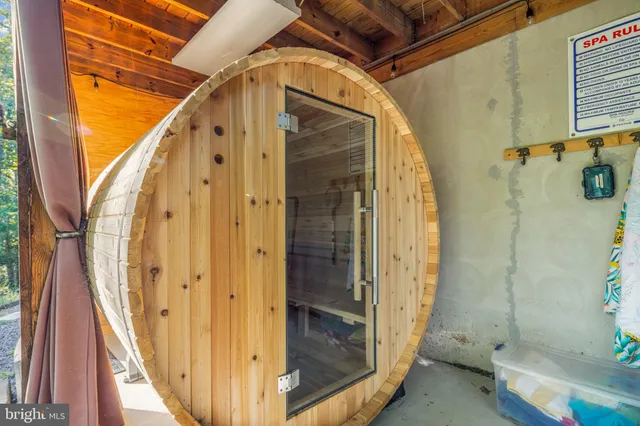 a view of a door with wooden walls