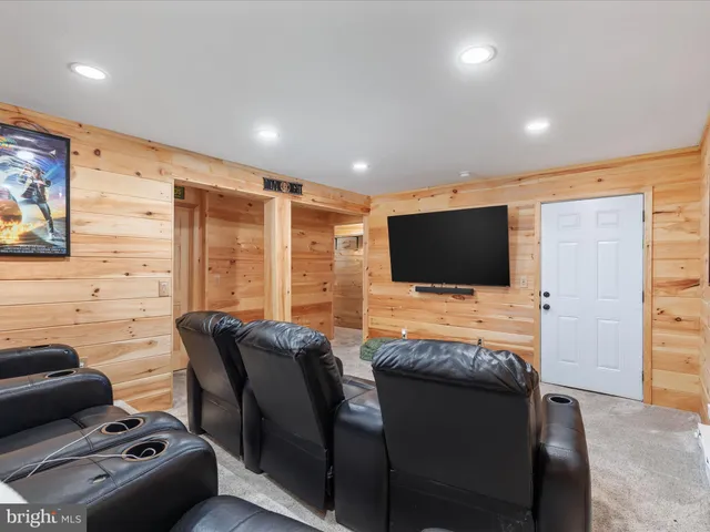 a view of a large building with a large tree