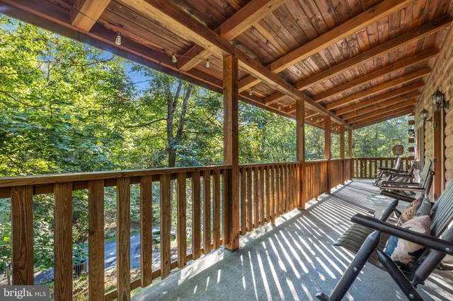 a view of a green field with lots of bushes
