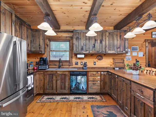 a view of a chairs and table in a patio