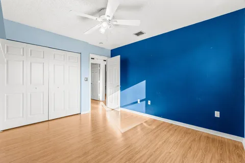 a view of a living room and a large window