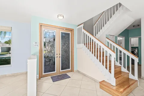 a view of an entryway with staircase