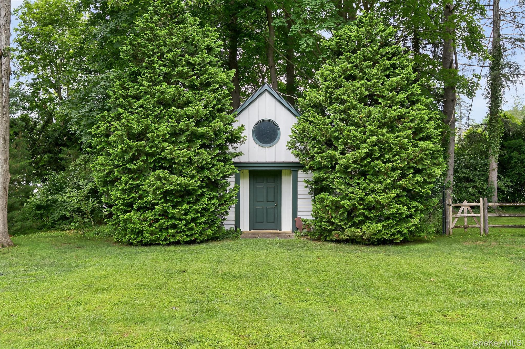 343 Chicken Valley Road Glen Head, NY 11545 - Photo 4 of 49 a front view of a house with garden