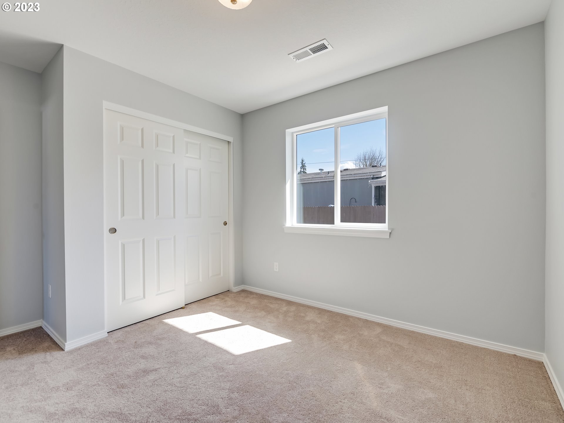 406 18th Street Springfield, OR 97477 - Photo 23 of 30 a view of empty room with windows