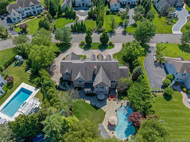 a view of entryway livingroom and hall with wooden floor