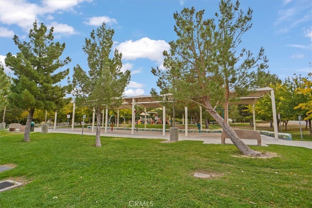 40287 Fieldspring Street Palmdale, CA 93591 - Photo 14 of 14 a view of a park with swings and slides
