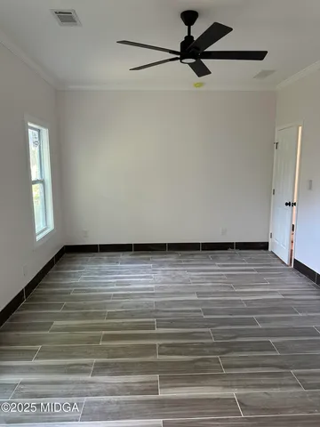 a view of a livingroom with wooden floor
