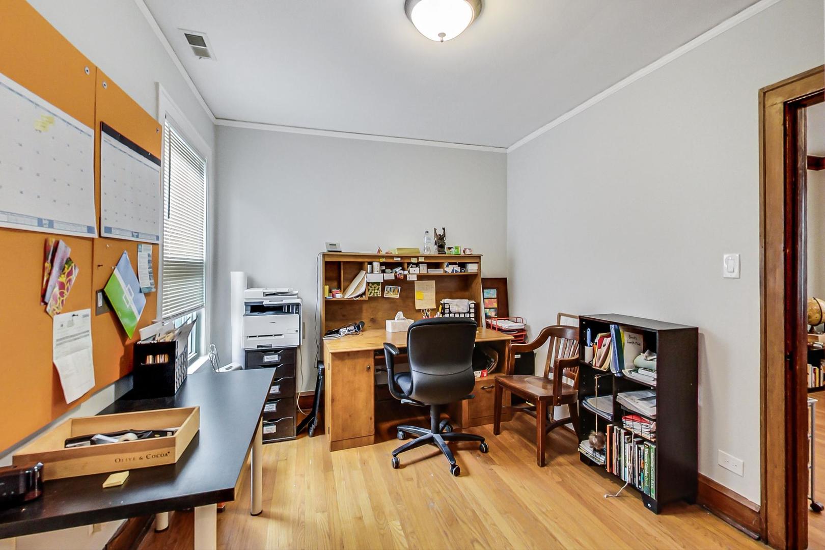 2143 West Superior Street, Unit 2F Chicago, IL 60612 - Photo 7 of 10 a view of a workspace with furniture and a window