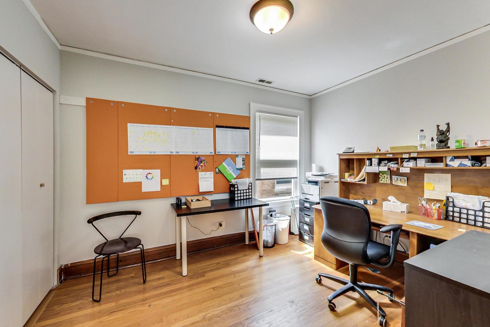 2143 West Superior Street, Unit 2F Chicago, IL 60612 - Photo 9 of 10 a view of a workspace with furniture and a window