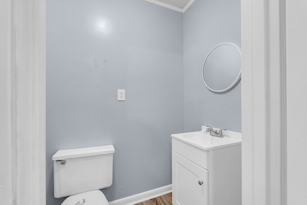 121 Twin Oaks Road Pikeville, TN 37367 - Photo 12 of 22 a bathroom with a toilet sink and mirror