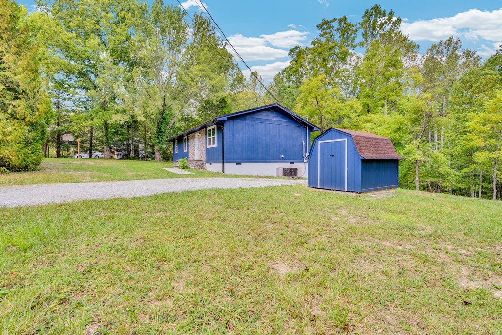 121 Twin Oaks Road Pikeville, TN 37367 - Photo 22 of 22 a big yard with large trees