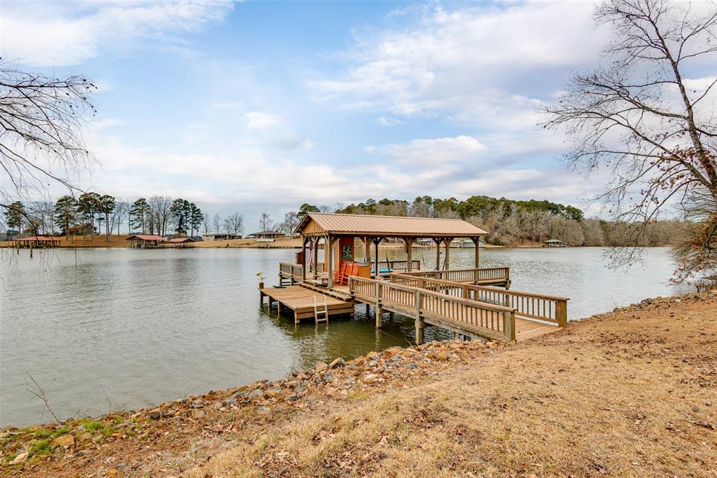 638 Featherston Road Homer, LA 71040 - Photo 5 of 10 Dock with a water view and boat lift