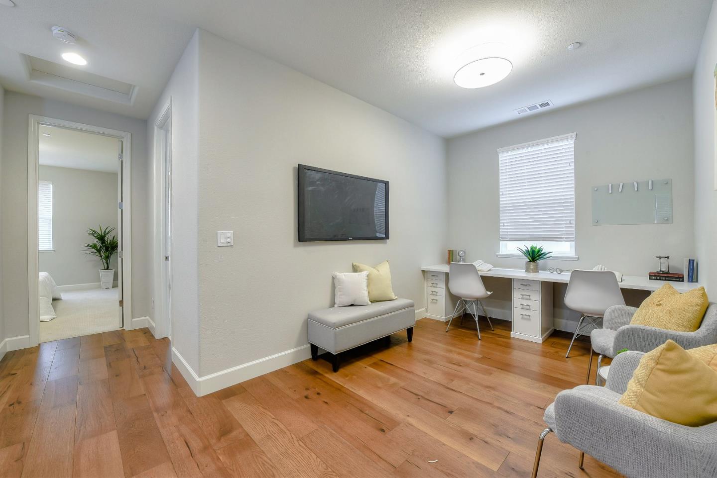 171 Cobblestone Loop Milpitas, CA 95035 - Photo 14 of 41 a living room with furniture and a flat screen tv