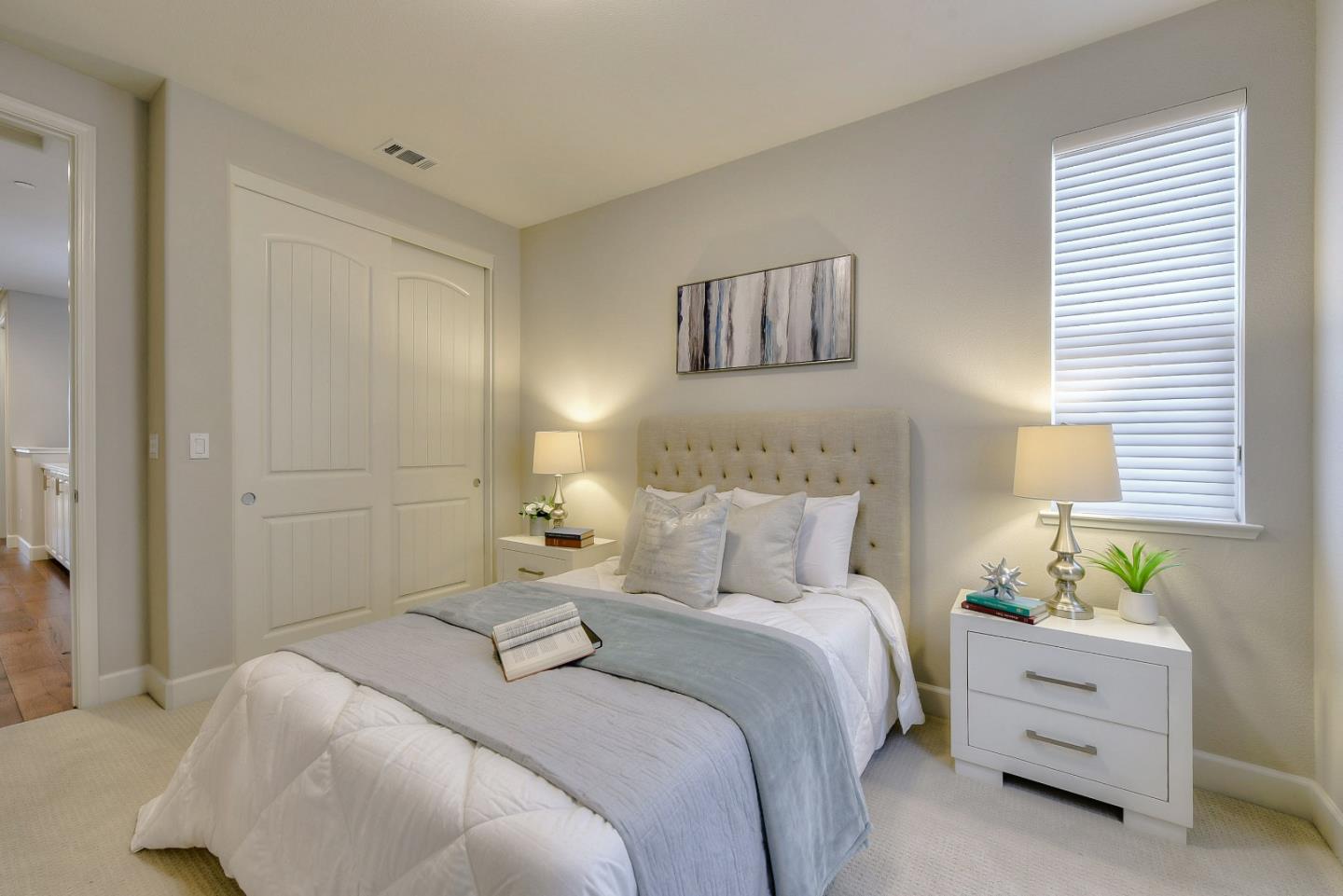 171 Cobblestone Loop Milpitas, CA 95035 - Photo 19 of 41 a bedroom with a bed and a painting on the wall