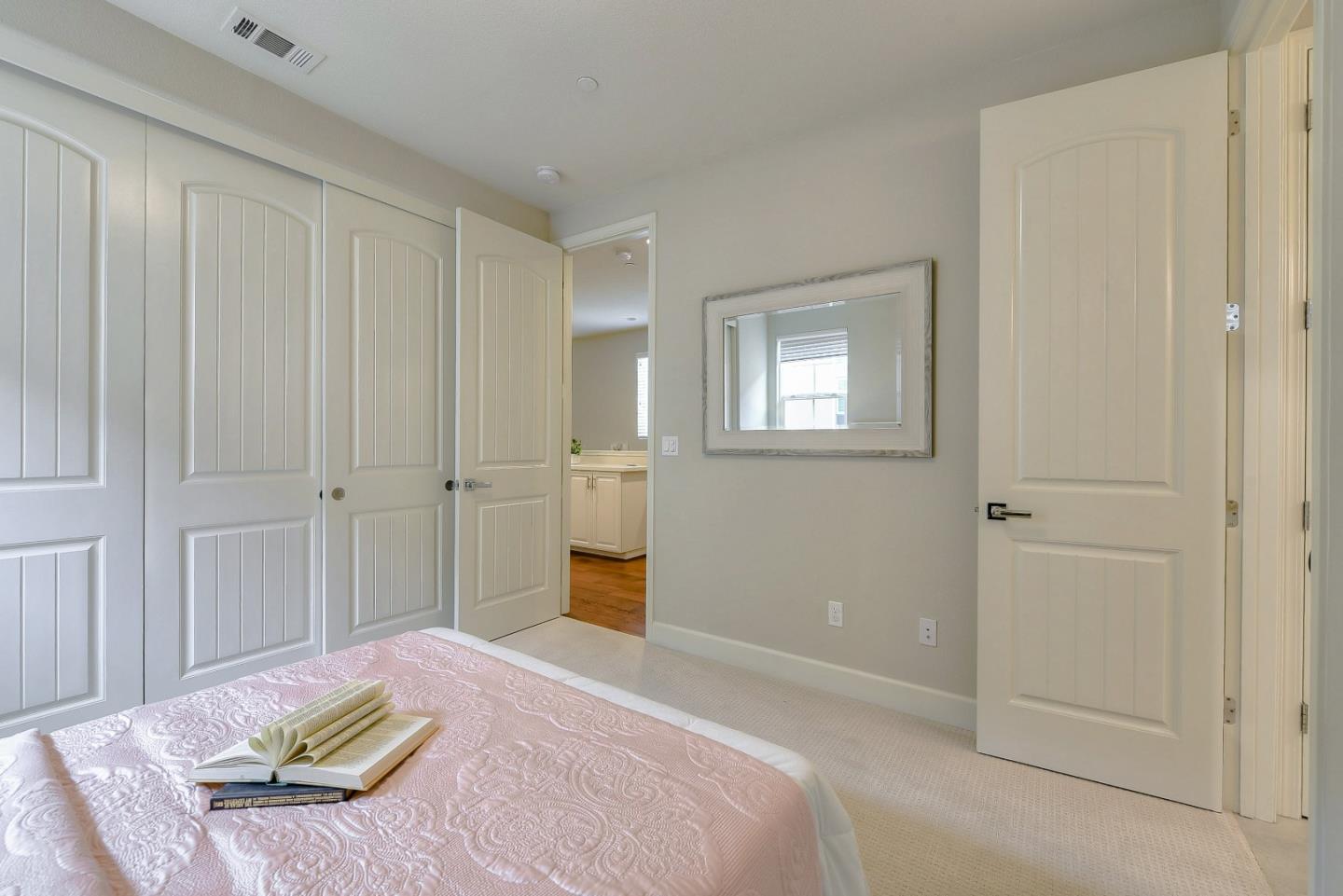171 Cobblestone Loop Milpitas, CA 95035 - Photo 24 of 41 a bedroom with a bed and a closet