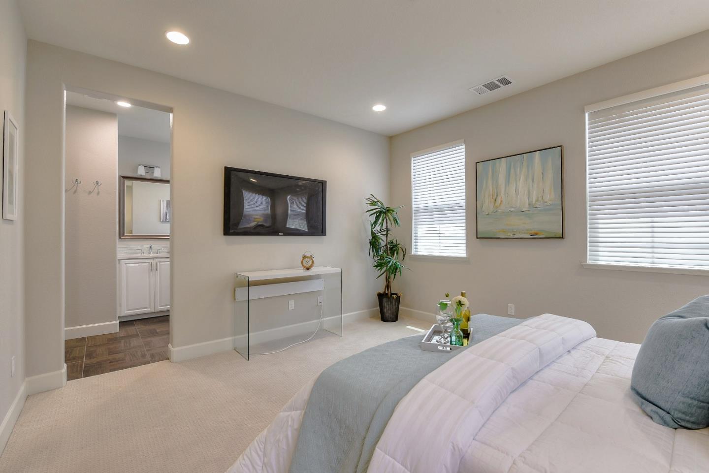 171 Cobblestone Loop Milpitas, CA 95035 - Photo 26 of 41 a bedroom with a bed and a flat screen television