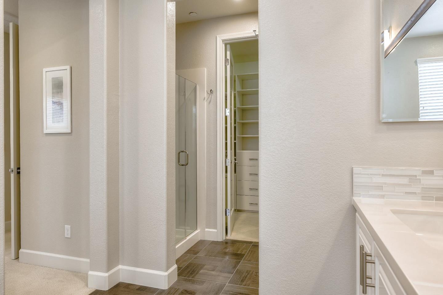 171 Cobblestone Loop Milpitas, CA 95035 - Photo 29 of 41 a view of a bathroom from a hallway