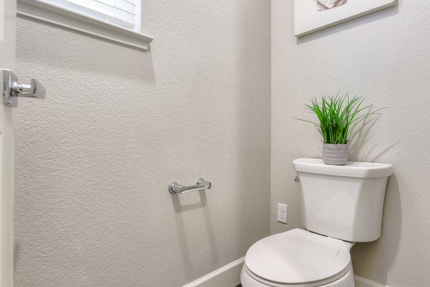 171 Cobblestone Loop Milpitas, CA 95035 - Photo 33 of 41 a white toilet sitting next to a white wall