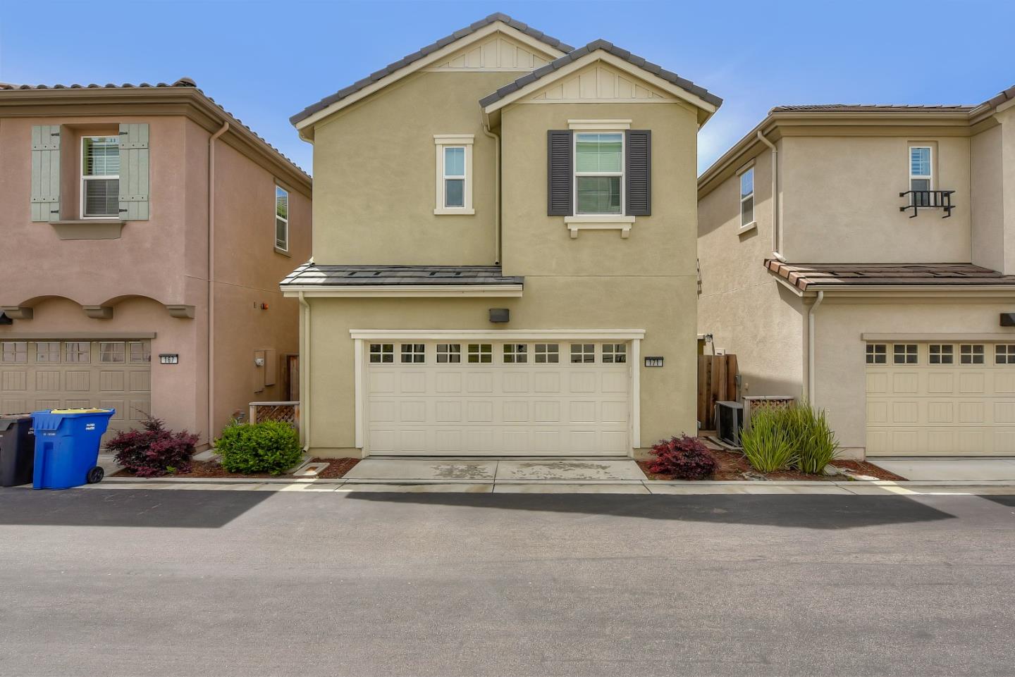 171 Cobblestone Loop Milpitas, CA 95035 - Photo 38 of 41 a front view of a house with a garden and garage