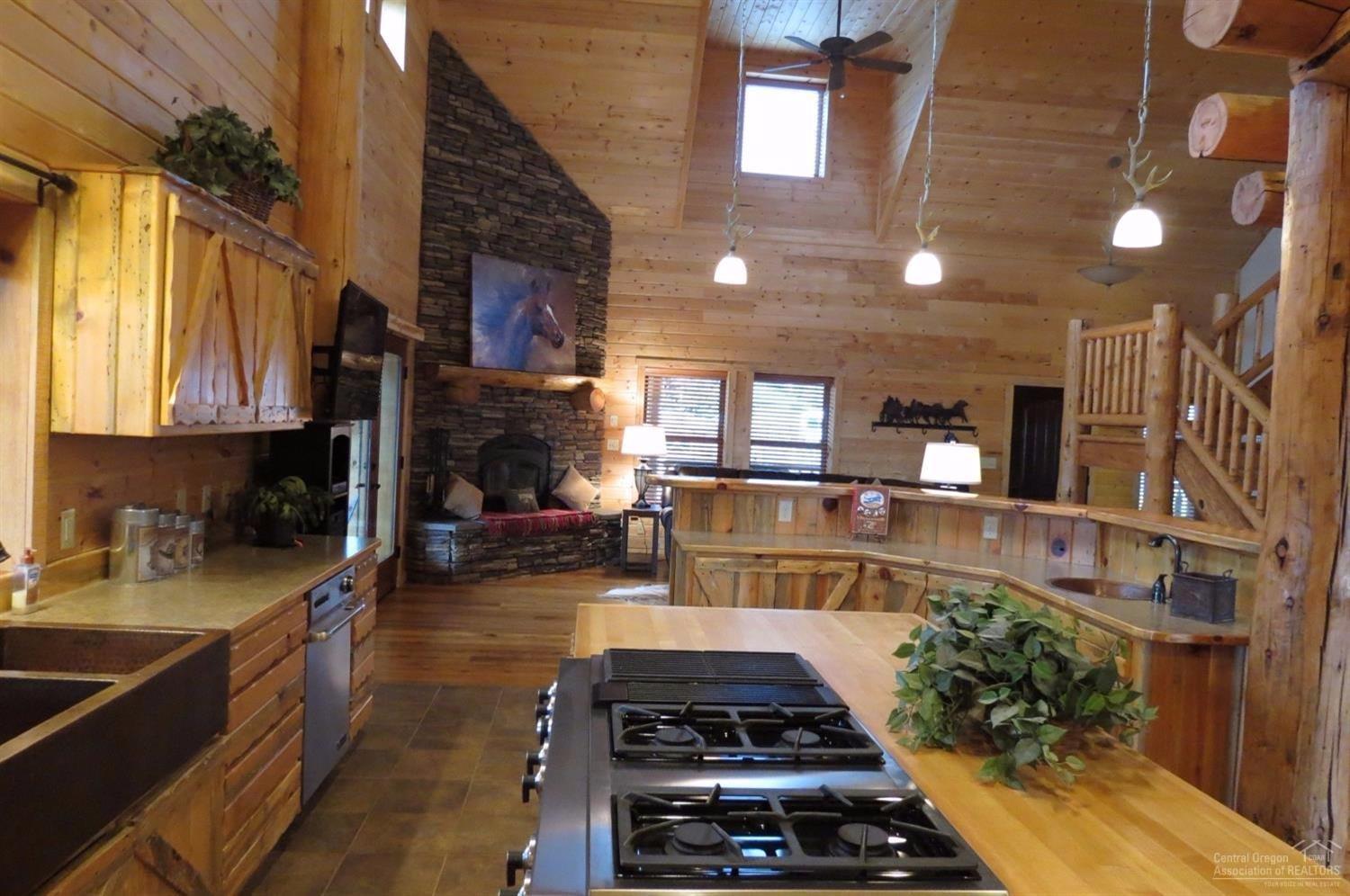 Custom kitchen with 2 hammered copper si