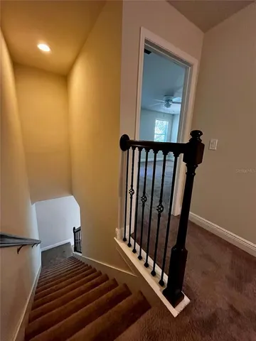 a view of a big room with windows