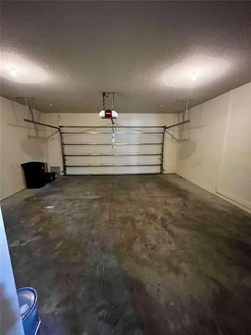 a view of a house with swimming pool and porch
