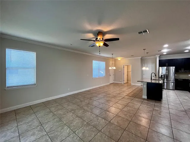a view of kitchen and windows