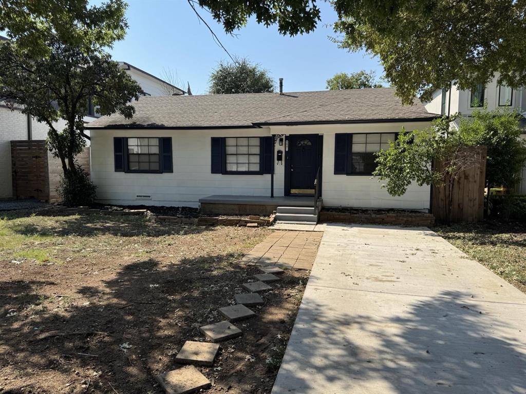 8427 Ridgelea Street Dallas, TX 75209 - Photo 17 of 17 a front view of a house with a yard