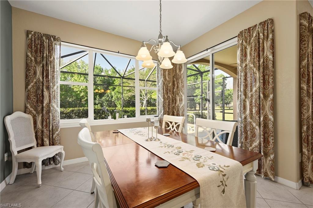 20674 Larino Loop Estero, FL 33928 - Photo 11 of 50 a living room with furniture and a large window