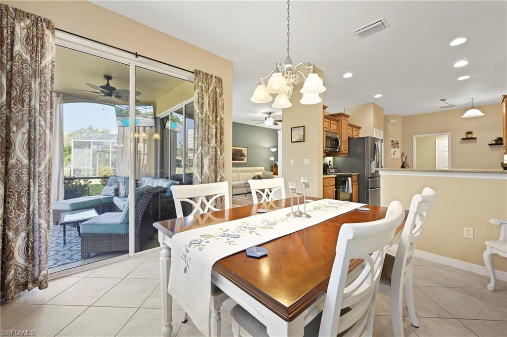 20674 Larino Loop Estero, FL 33928 - Photo 12 of 50 a view of a dining room and livingroom view