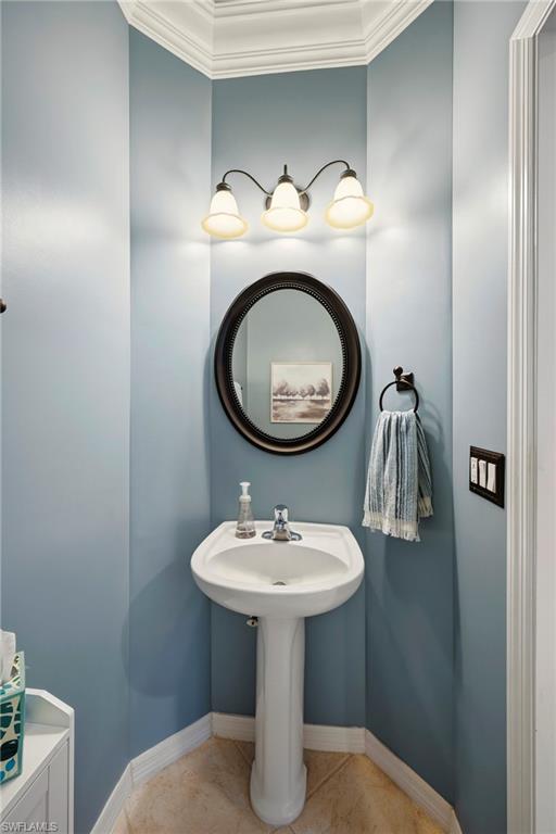 20674 Larino Loop Estero, FL 33928 - Photo 18 of 50 a bathroom with a sink toilet and a mirror